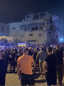 تصاویر لحظه اصابت موشک حزب الله به تل آویو